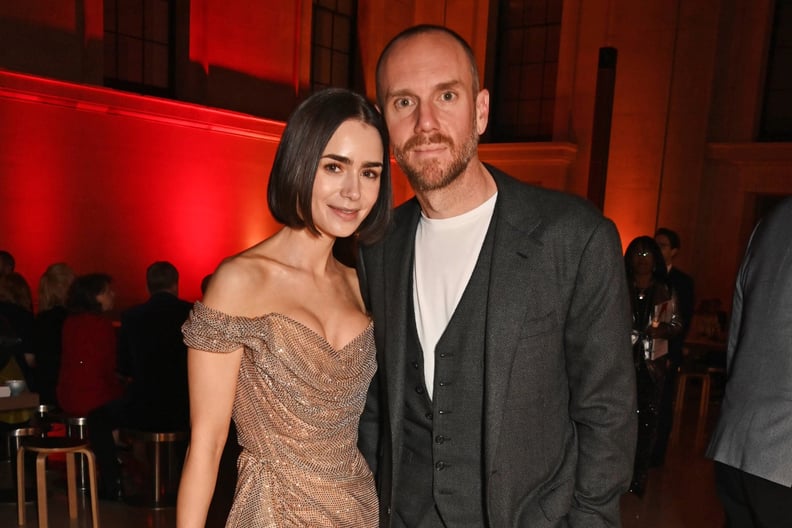 Lily Collins and Charlie McDowell attend the Emily in Paris event.